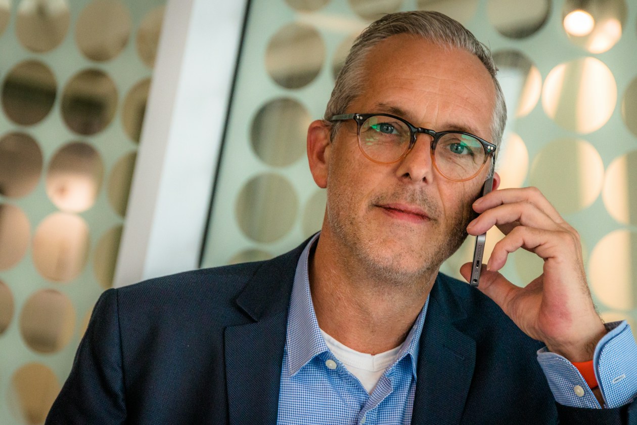 Businessman following up a lead by phone